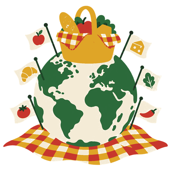 A globe on a picnic blanket with a hamper on top